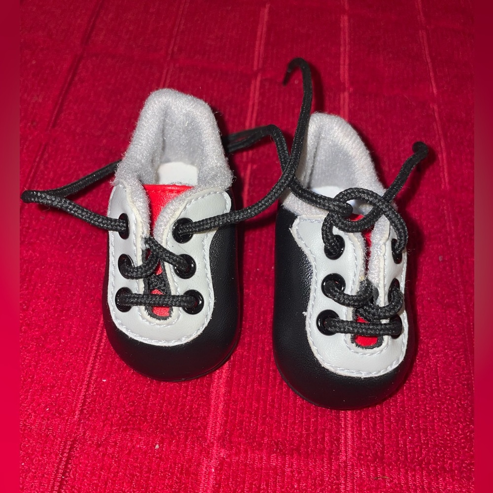American girl doll cleats that fit an 18” doll.. NWOT see pics